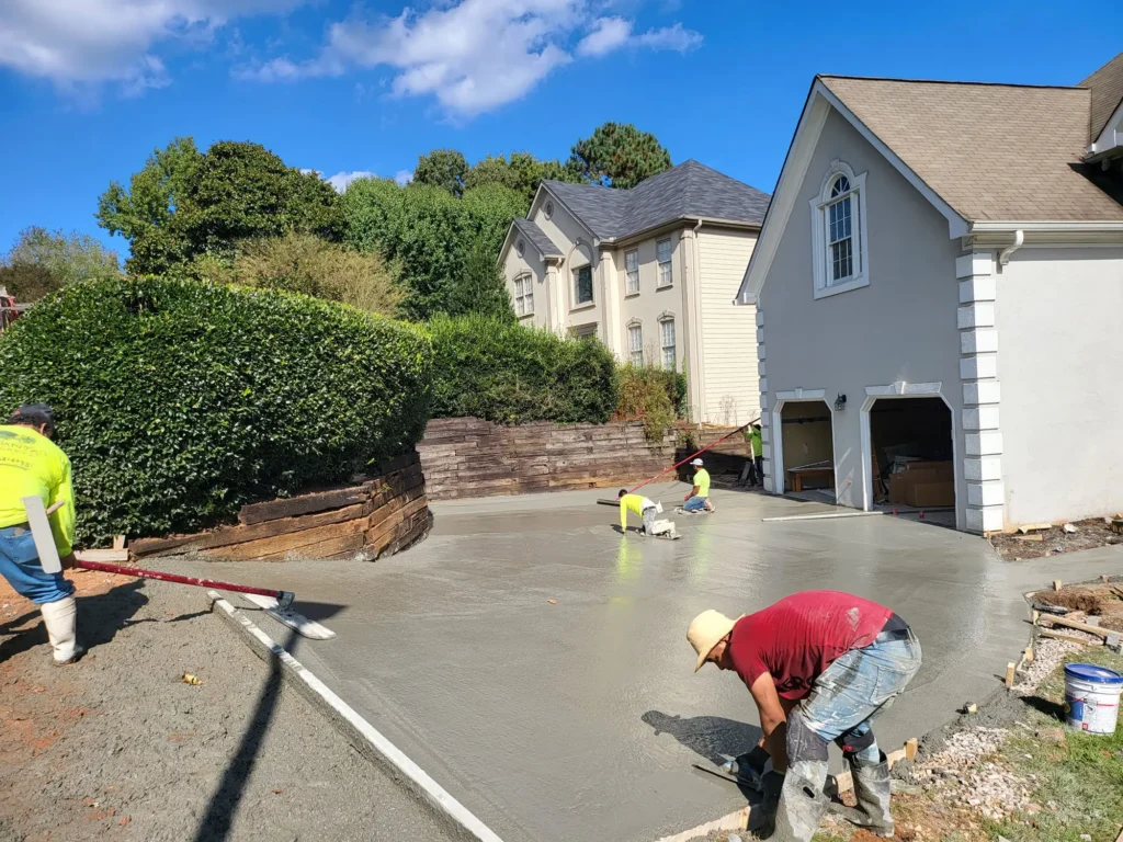 Rodney Concrete driveways with custom borders patterns and edging.